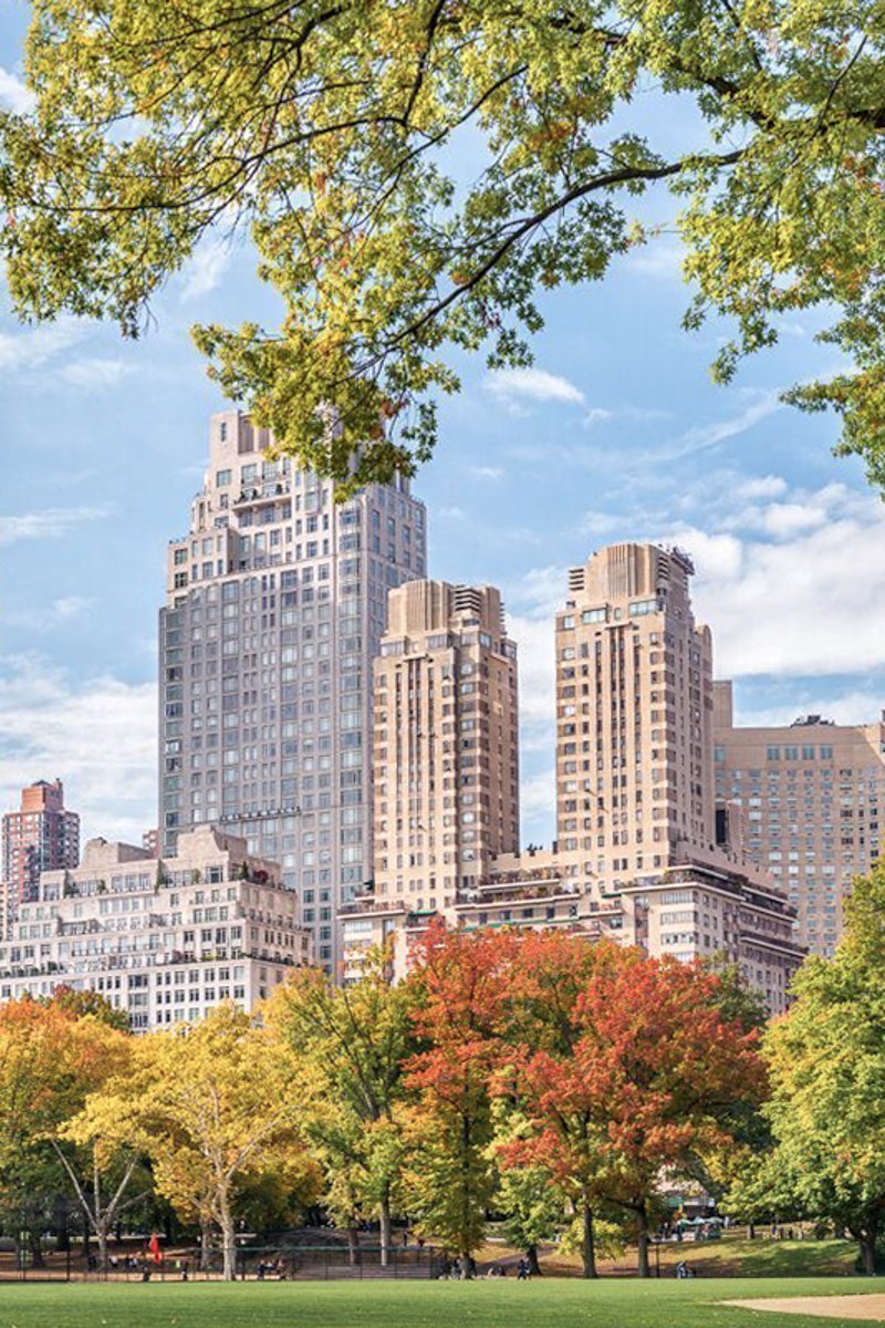 Manhattan buildings in foliage season from Central Park - New York City, USA.