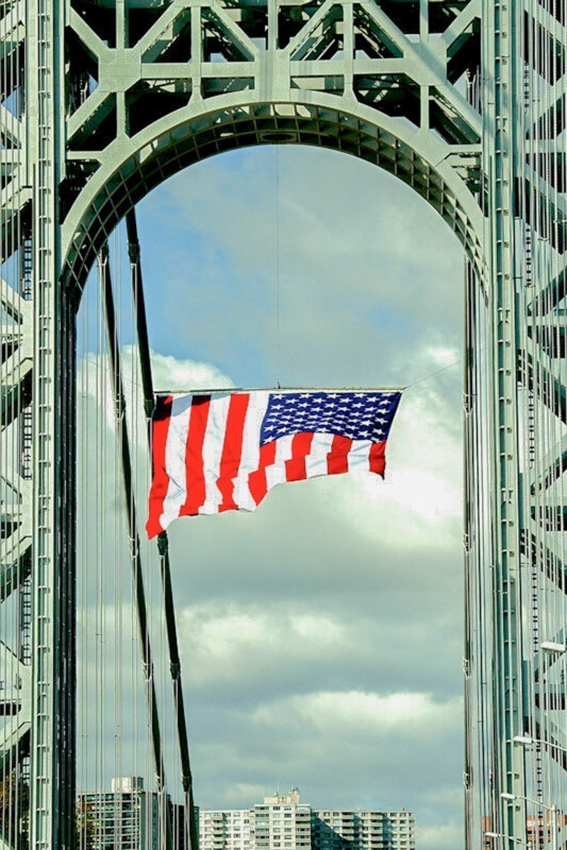 Large American Flag flying from George Washington Bridge