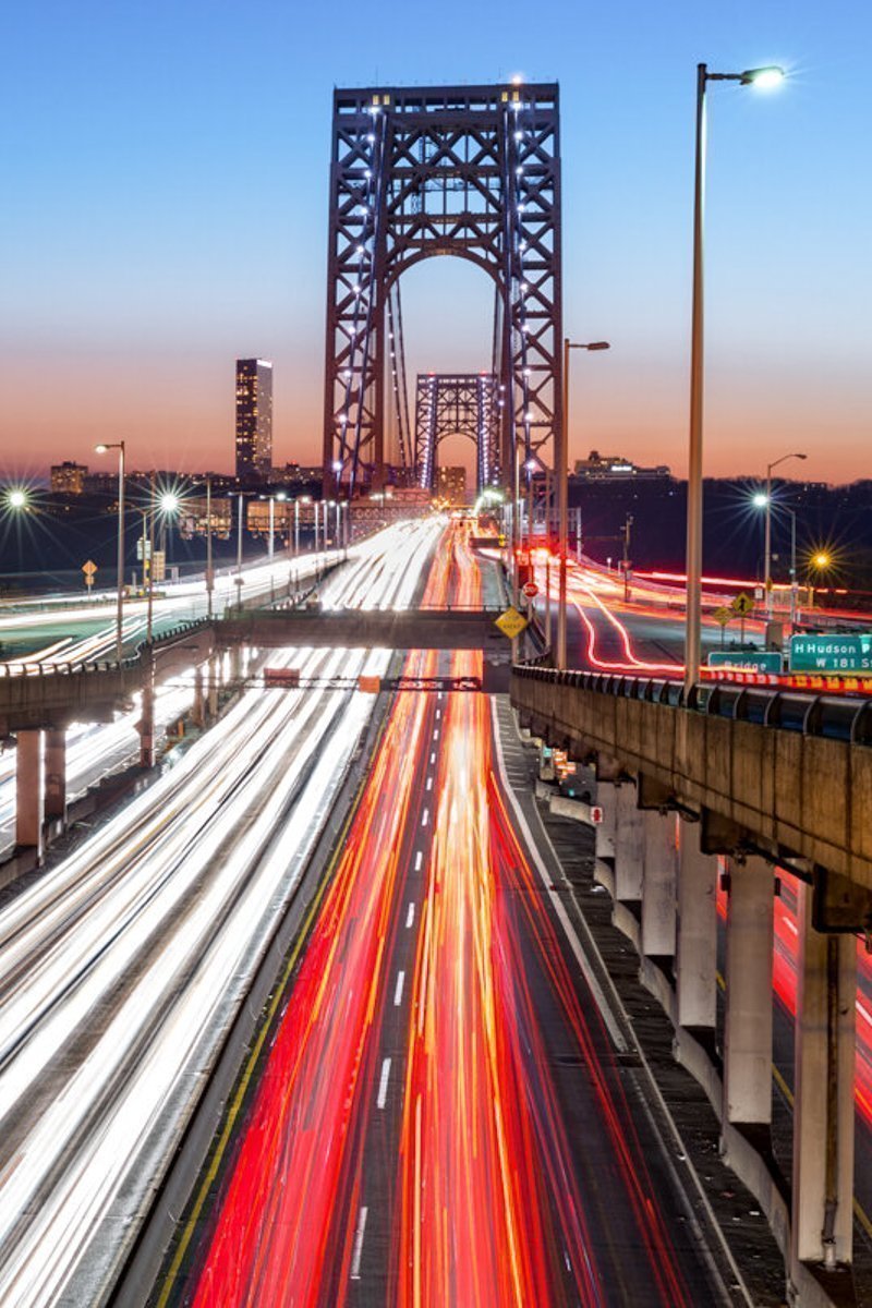 Rush hour traffic with light trails on George Washington Bridge, in New York City